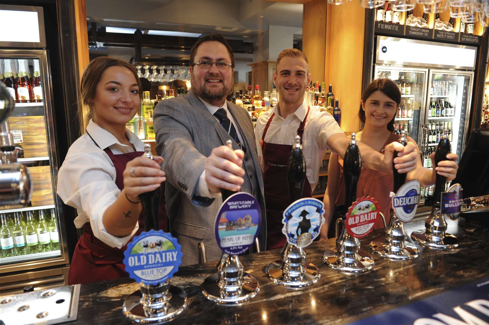 Opening of new Wetherspoons. L-R: Louise Conker, Manager, Peter Pethers, Dillon Price and Jodie Williams.