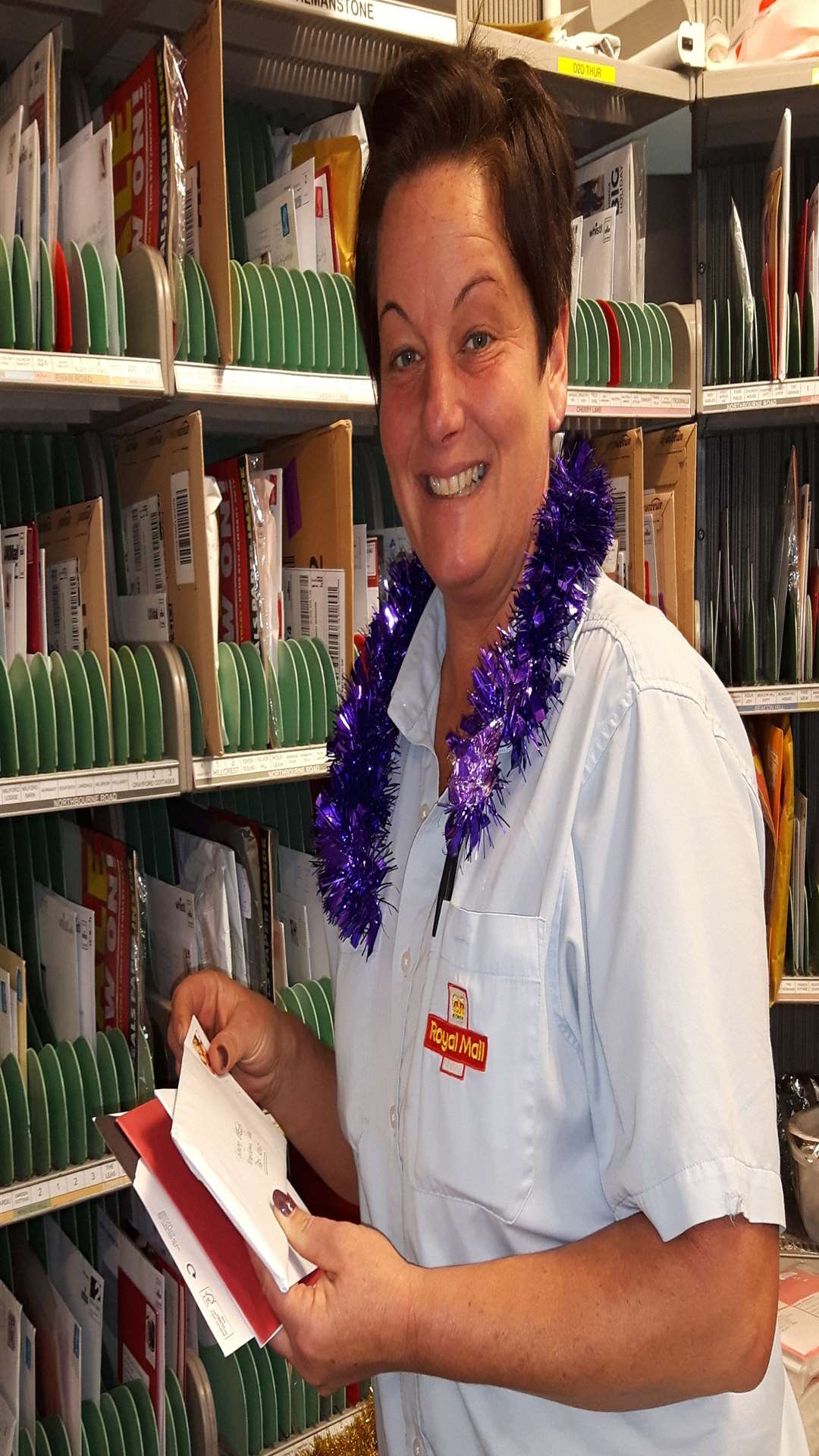 Joanne Wells organises post at Deal Delivery Office