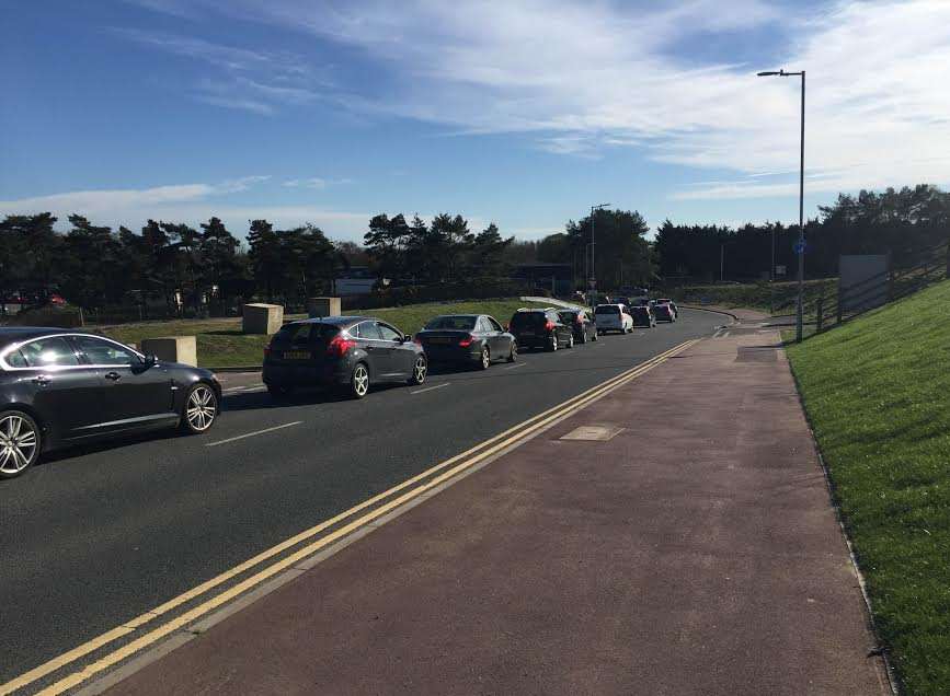 Eye witnesses report queues more than 50 cars long in the hospital car park