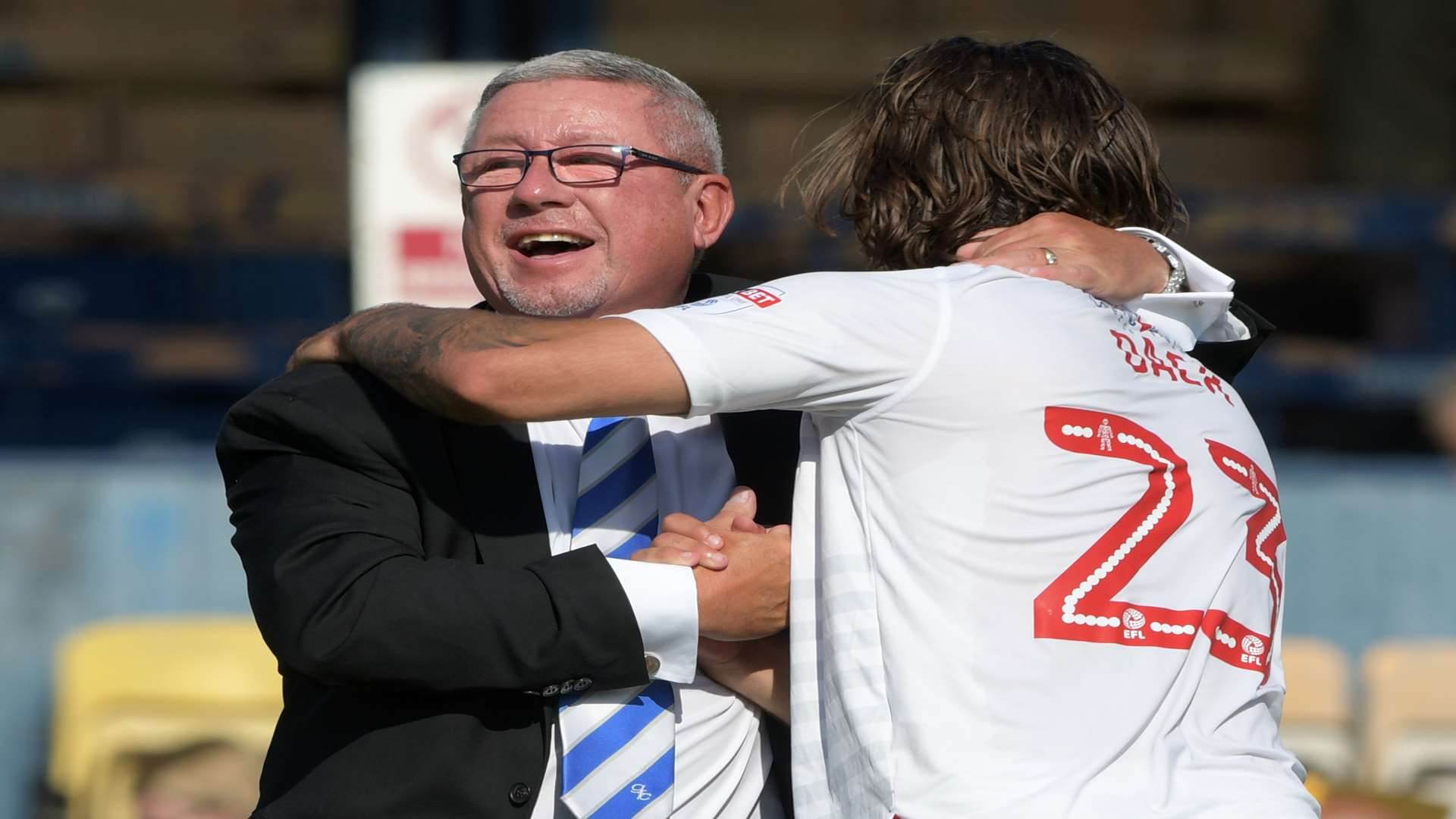 Gills chairman Paul Scally and Bradley Dack at the end of the game. Picture: Barry Goodwin