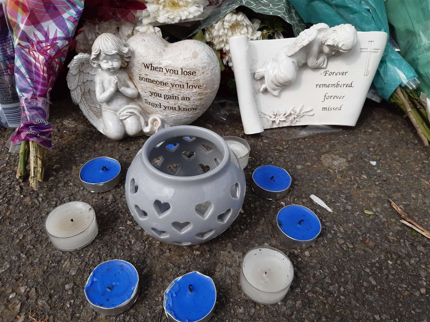 Candles left at the roadside in South Ashford