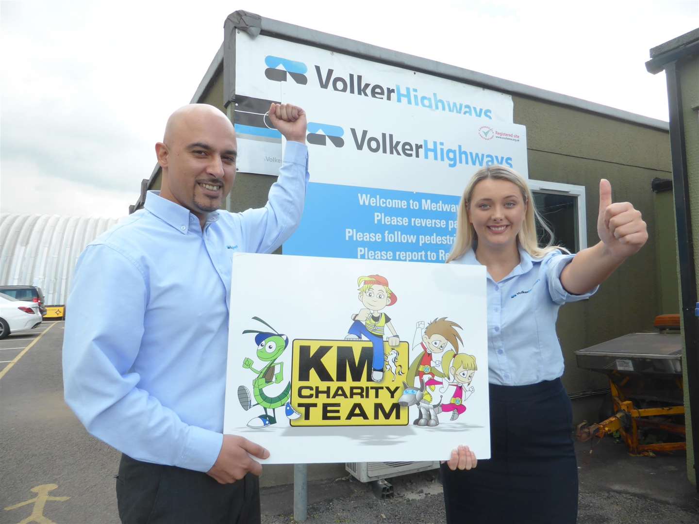 Sohail Hussain and Shannon Rivolta of Volker Highways, which supports the KM Walk to School campaign. (2676819)