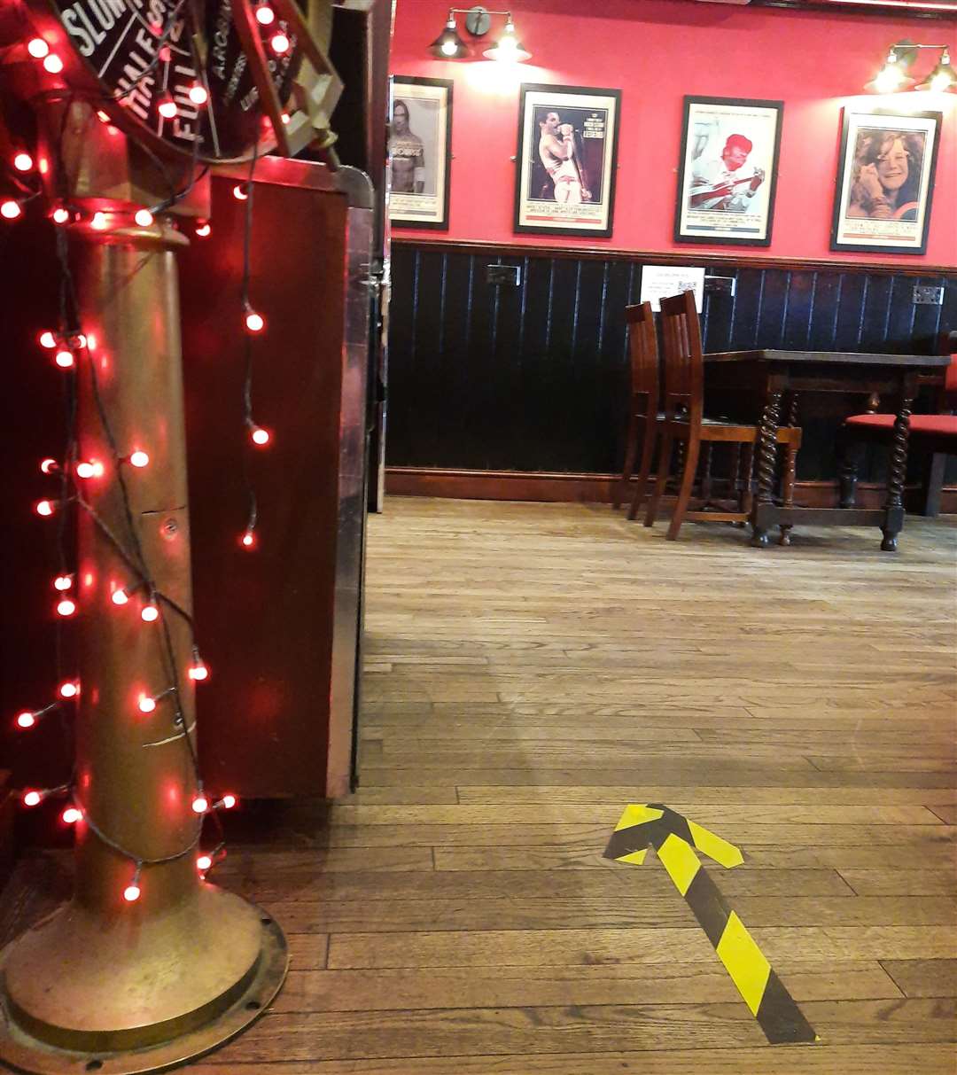 One of the many arrows taped to the floor of the Lady Luck