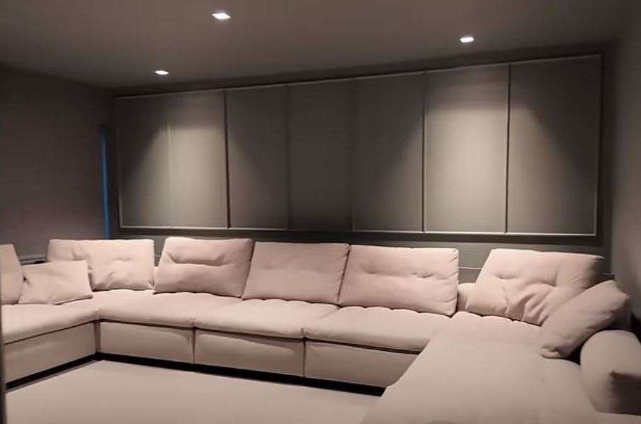 The house has a large cinema room where the children watch their dad on Gladiators. Pic: YouTube/MattDoesFitness