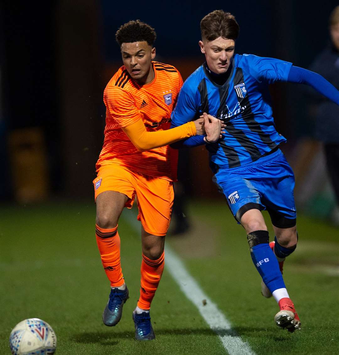 Gillingham vs Ipswich Town, FA Youith Cup 4th round, 11th January 2019..Toby Bancroft is hustled off the ball and the pitch by Dylan Crowe. (38352801)