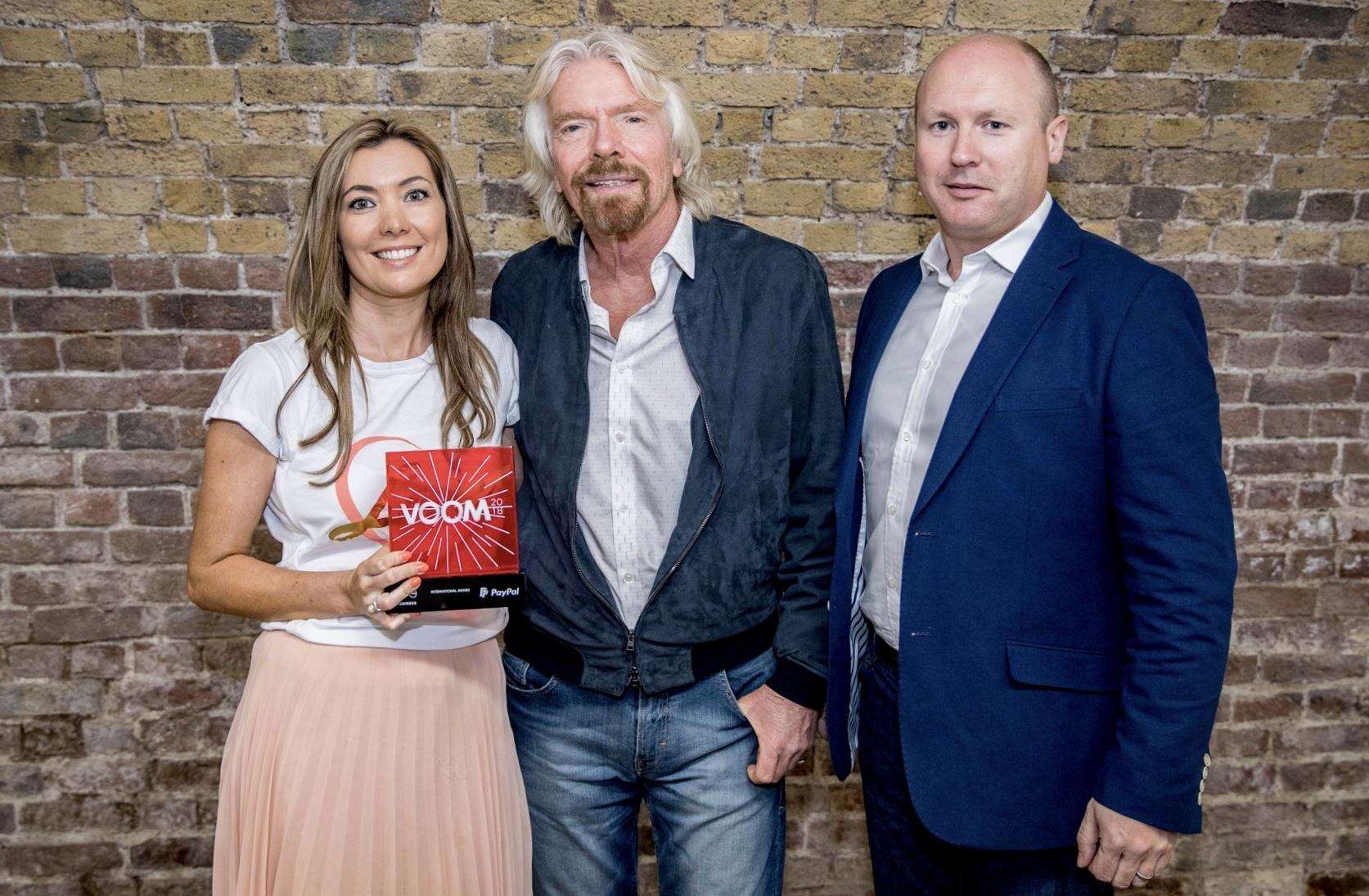 Lauren Hampshire is presented with her award by Virgin boss Richard Branson and PayPal boss Mark Brant (2273884)