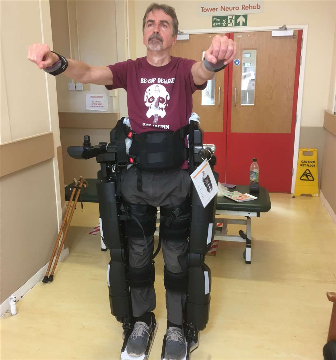 Steve Barnes in the robotic exo-skeleton. Picture: NHS
