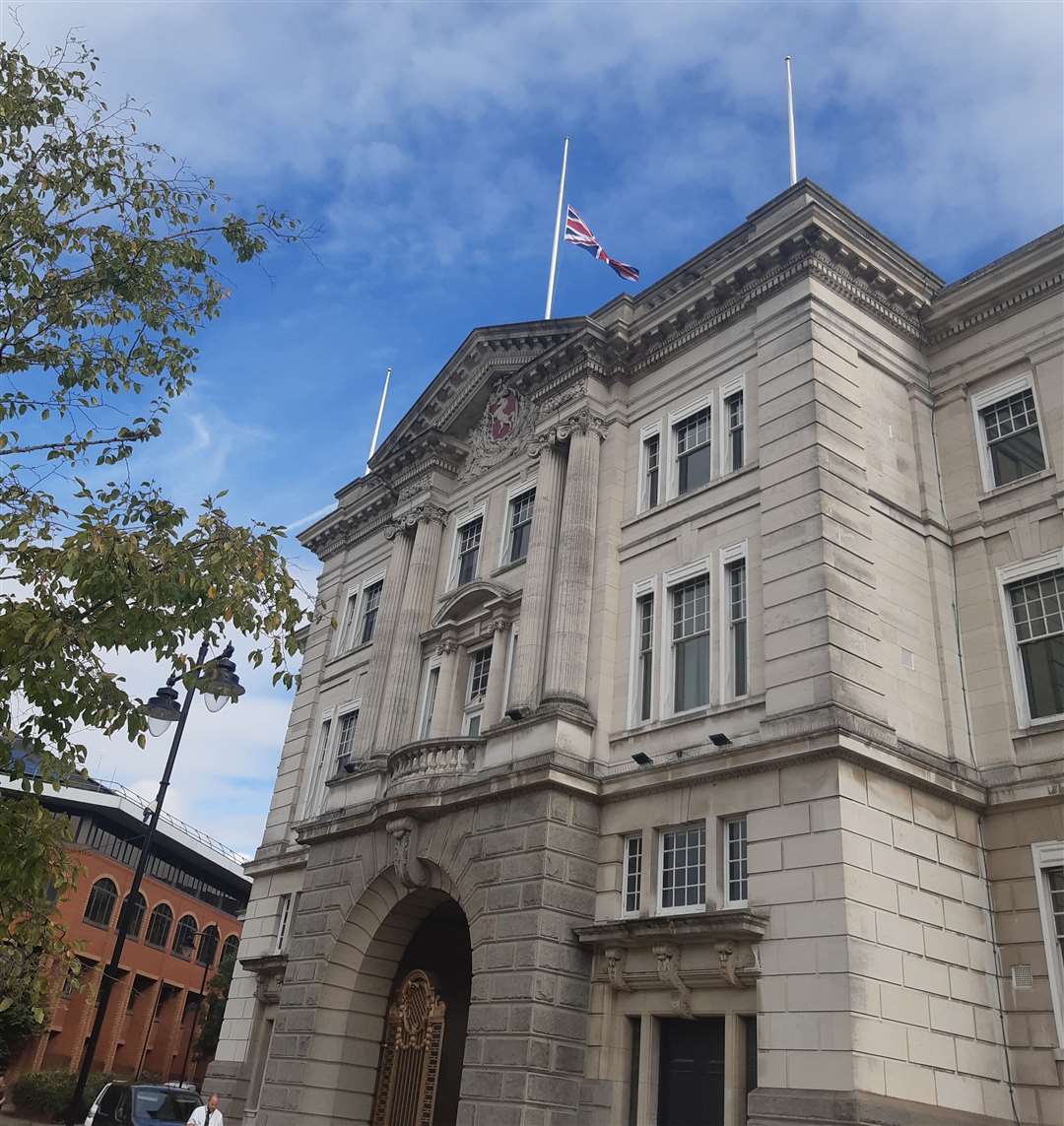 The flag at County Hall flies at half-mast for the Queen