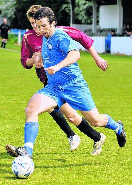 Dave Read of Mon United in action during the Tommy Coulter Memorial Cup final