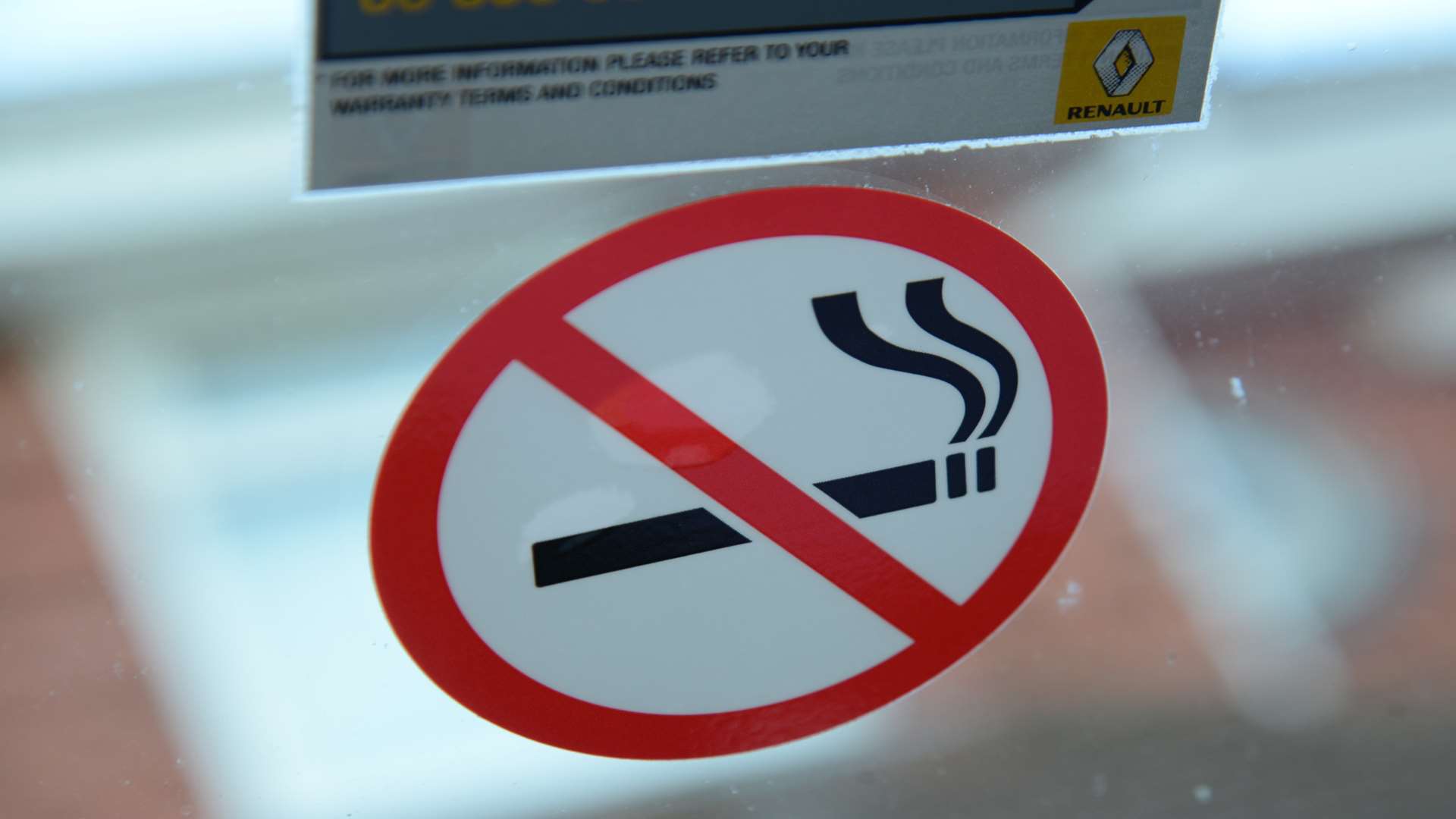 It's the law that you must put a no smoking sign in a work van