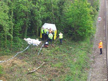 Police tent where bones were found beside Herne Bay railway tracks