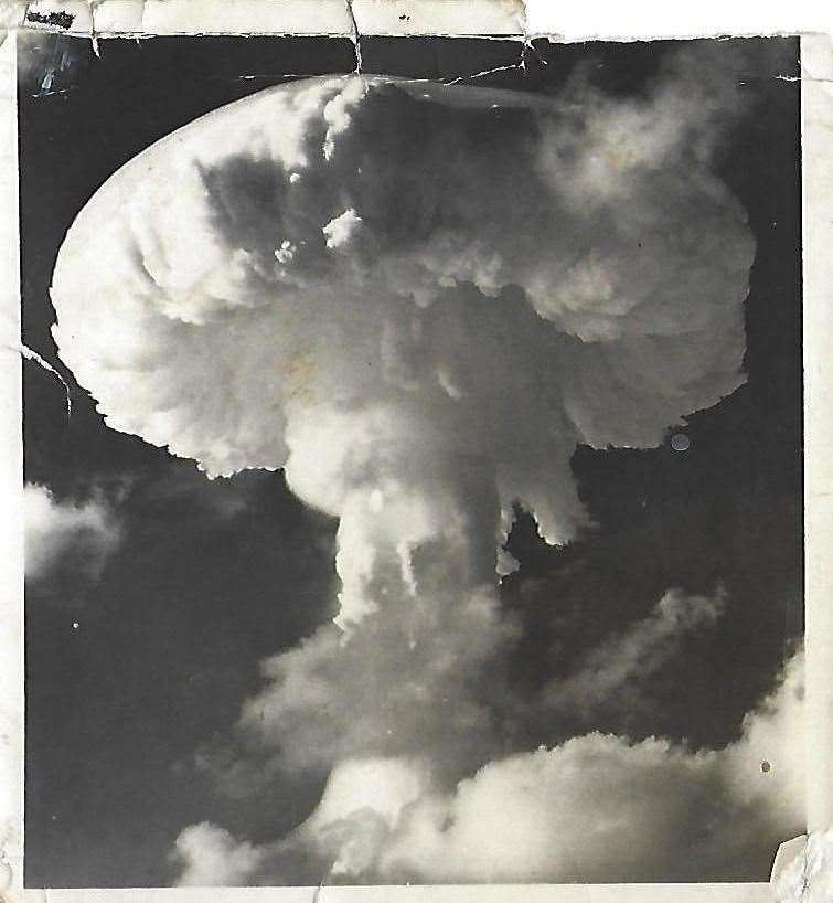A snap of the mushroom cloud taken by one of the servicemen