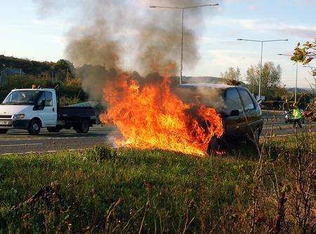 Car on fire just before the Whitstable turn on the coast-bound Thanet Way