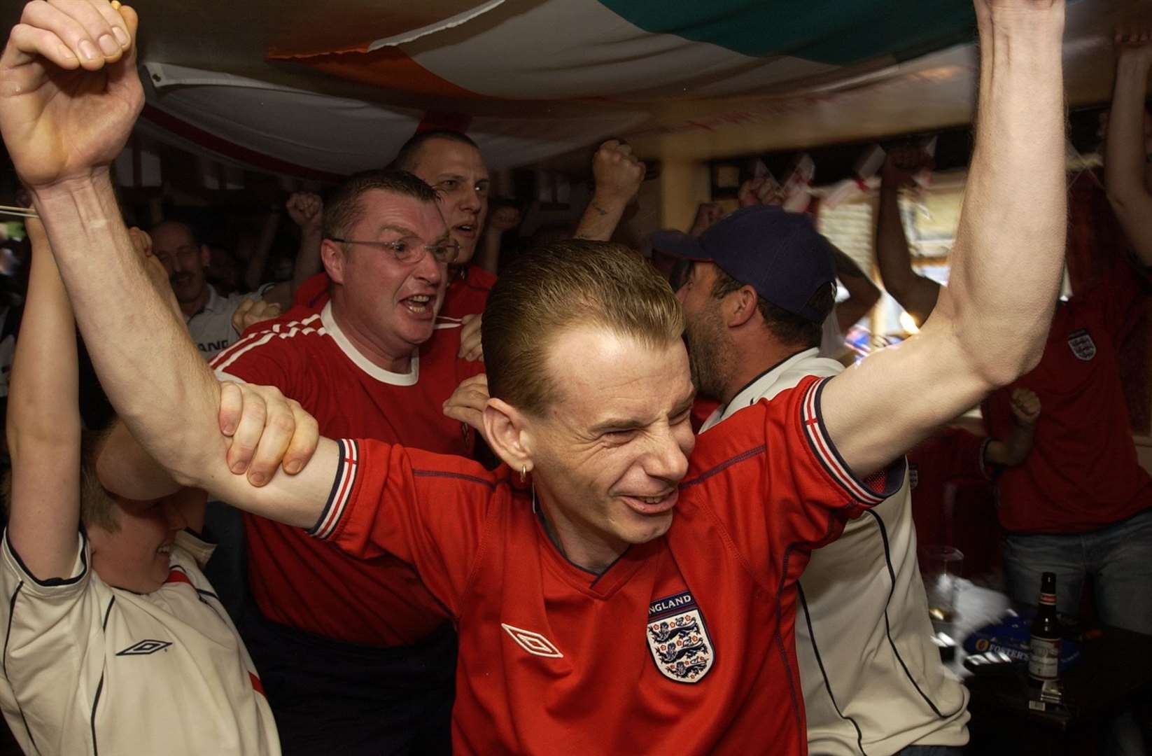 The Six Bells, Gravesend, as England fans celebrate Michael Owen's first-half goal against Brazil in the quarter final