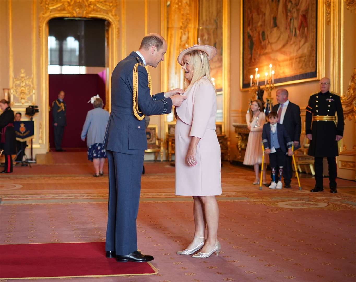 Paula Hudgell is made an OBE by the Prince of Wales at Windsor Castle (Yui Mok/PA)