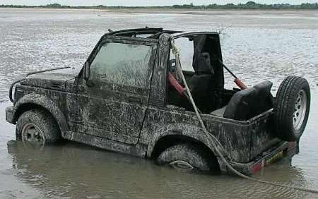 The four- wheel drive vehicle stuck in the mud. Picture: MIKE PETT