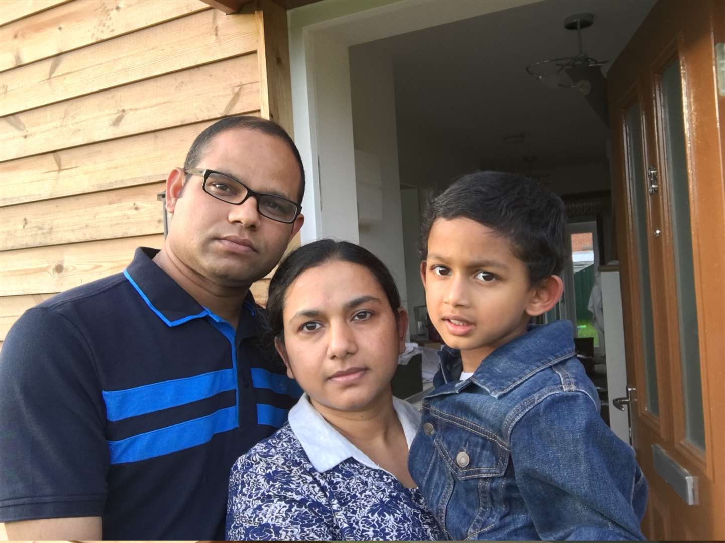 Debi Das (left) with his wife Swagatika Patra and son, four-year-old Divyum.