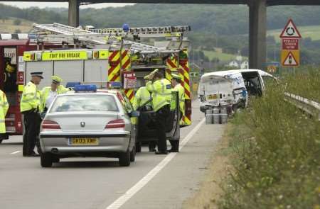 The emergency services at the crash scene. Picture: ANDY PAYTON