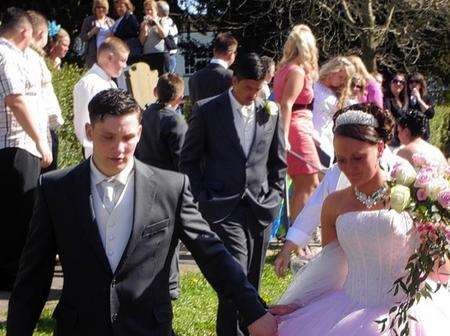 The crowd clapped as Ashford Boxing Club member Levi Smith, 21, married his bride Priscella Wilson, 20, of High Halden, at St Mildred’s Church, Tenterden
