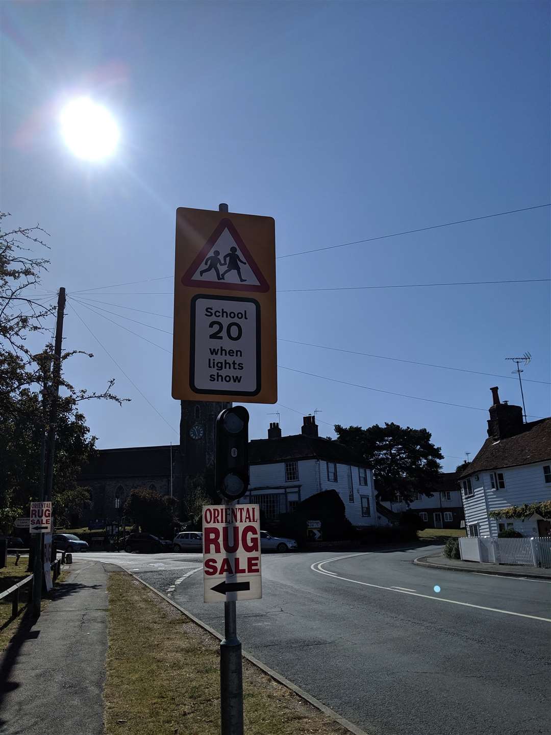 The'slow down' warning sign where the lights are not activated (17328233)