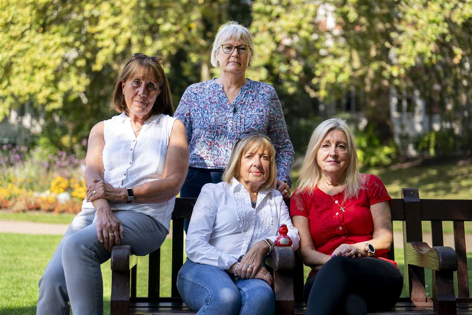 The women formed a group of eight which includes Christine Burney (in red), whose husband died after being infected with hep C (Jordan Pettitt)