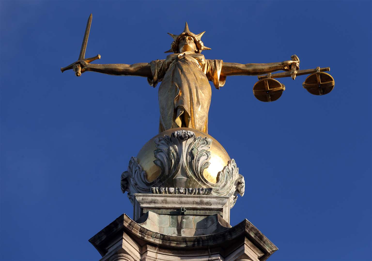 Still standing: FW Pomeroy’s Statue of Justice on top of the Old Bailey in central London (Jonathan Brady/PA)