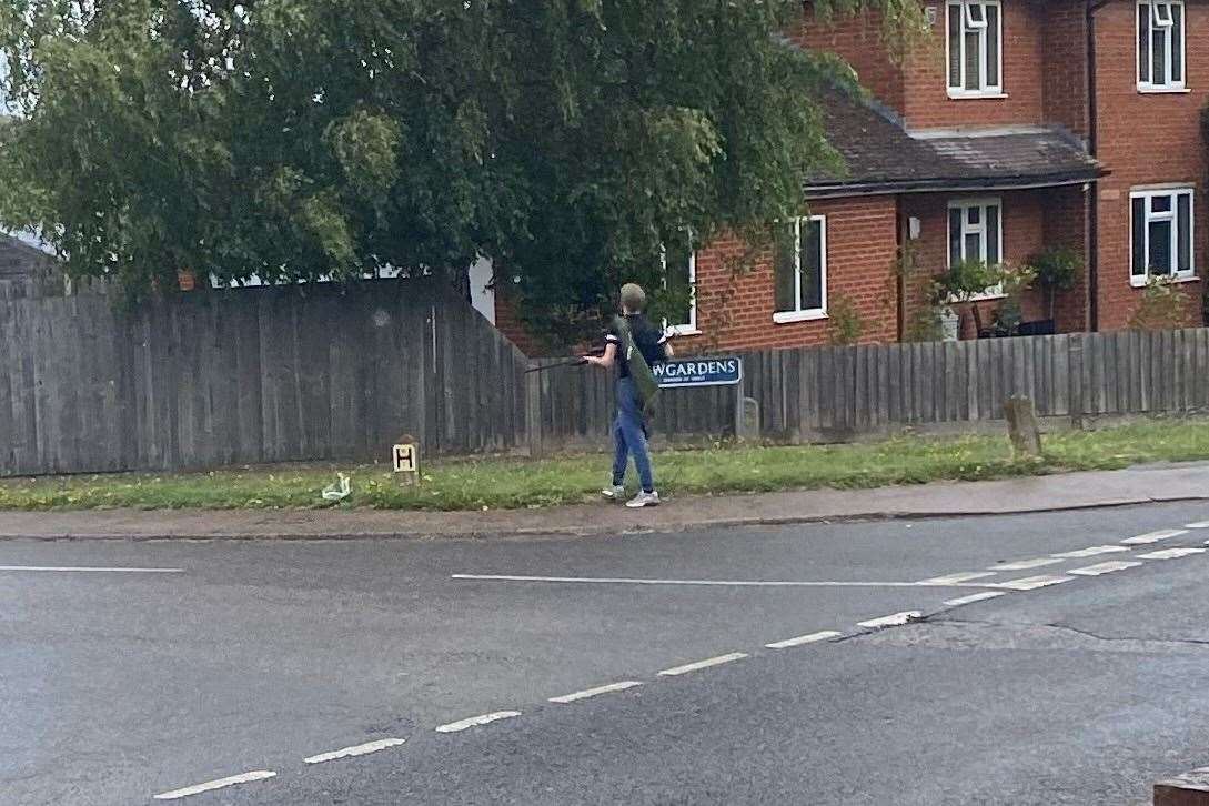 A man pictured with an air rifle in Teynham