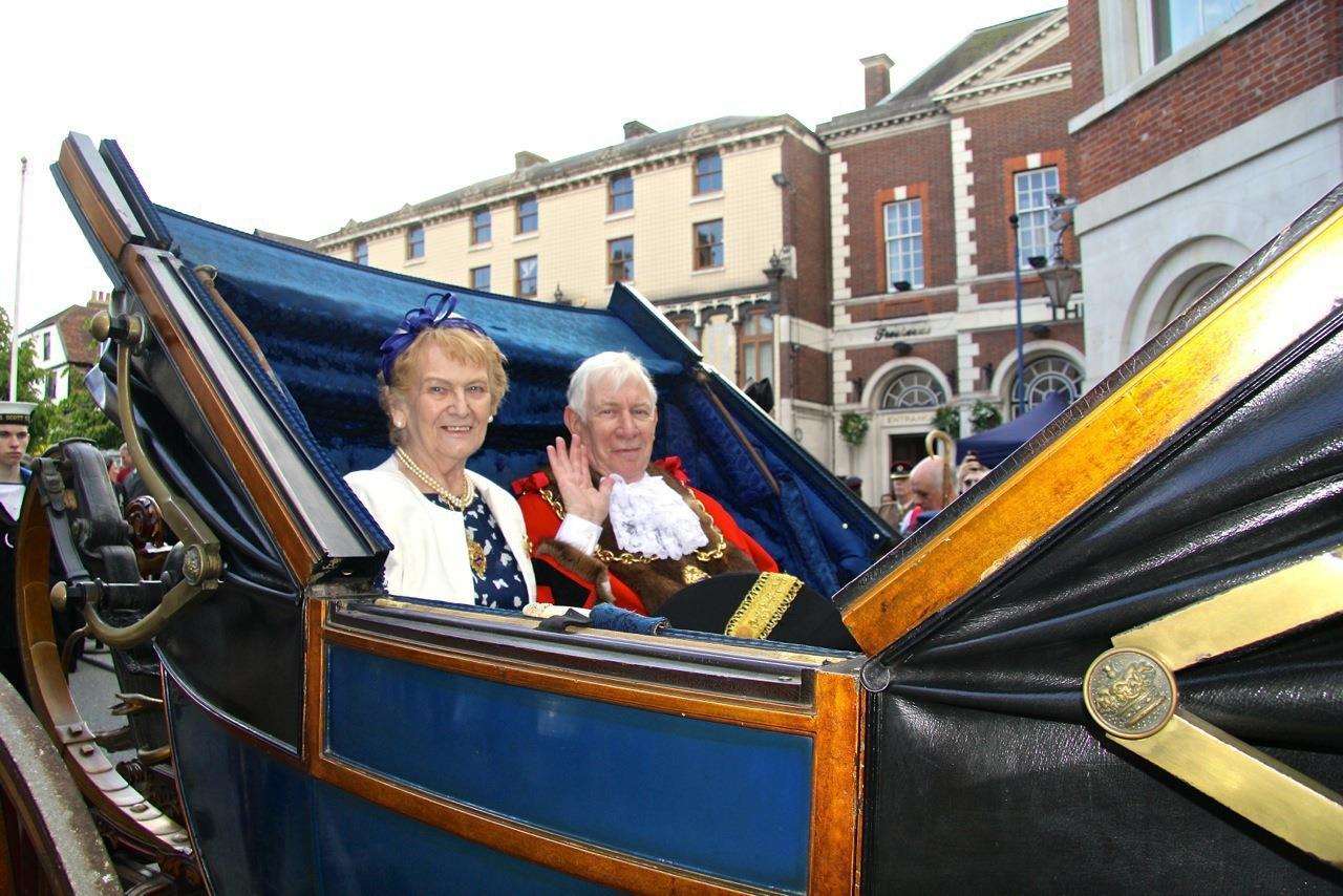 The retiring Mayor, Cllr Malcolm Greer, enjoys taking an open carriage ride with his wife Brenda on his Civic Parade last year