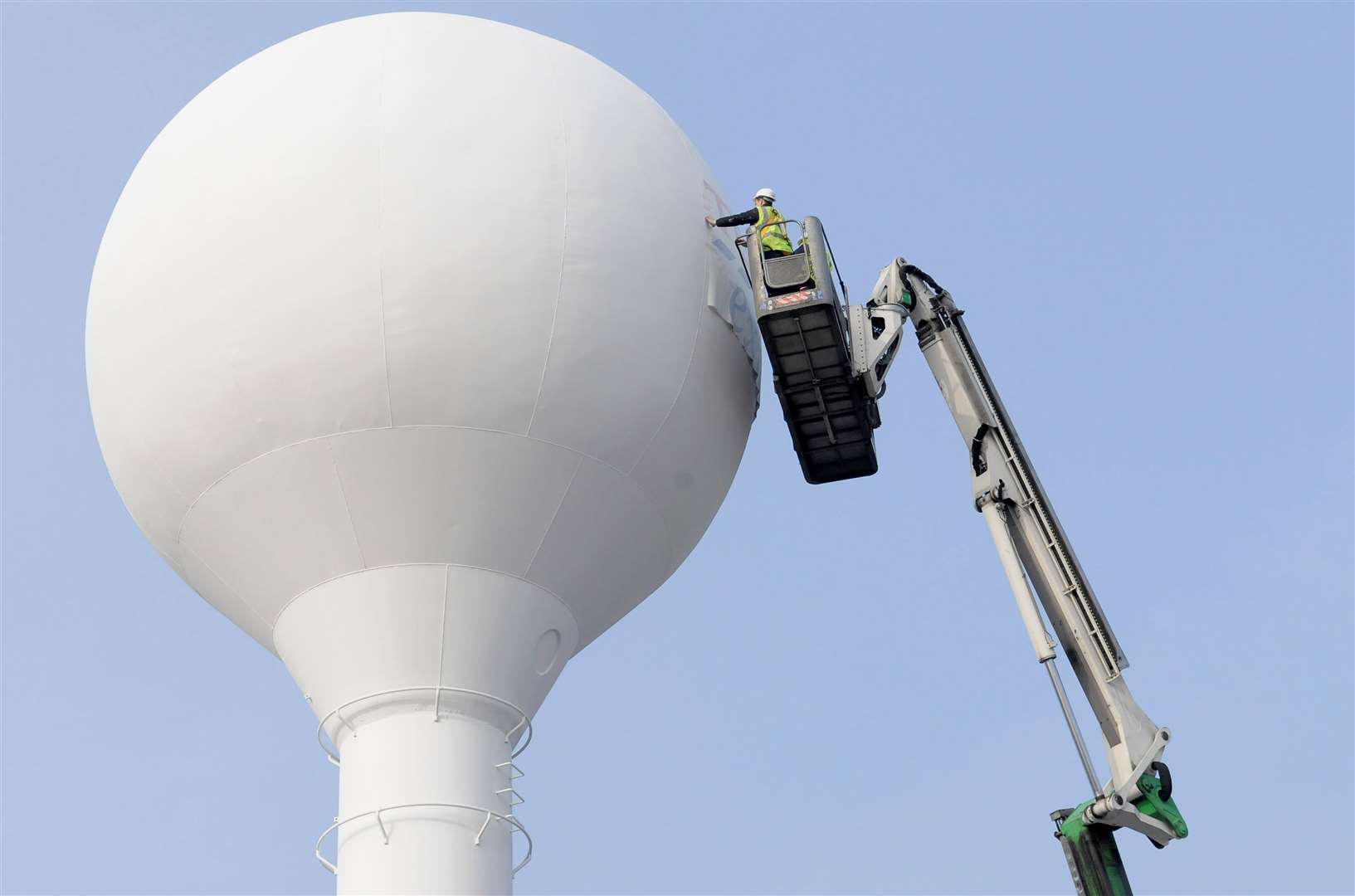 The water tower being repainted back in 2011 after a refurbishment at the Tesco store. Picture: Andy Payton