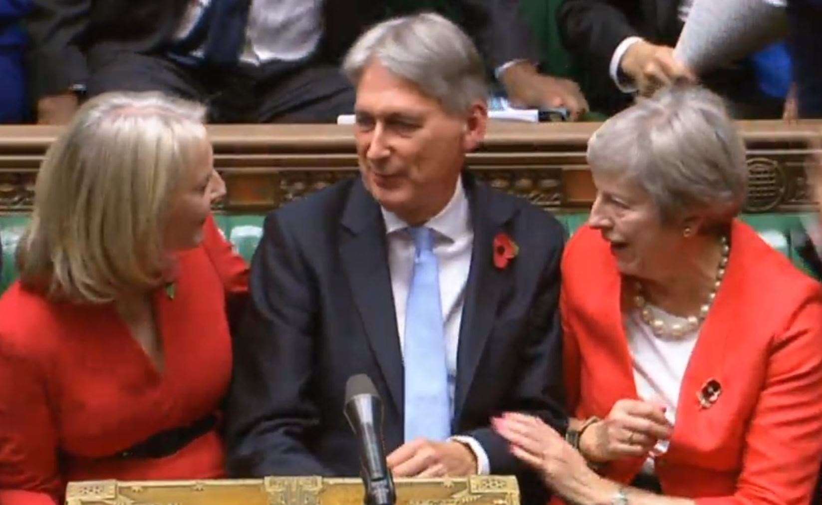 Liz Truss (left), then-chancellor Philip Hammond, and Theresa May (PA)