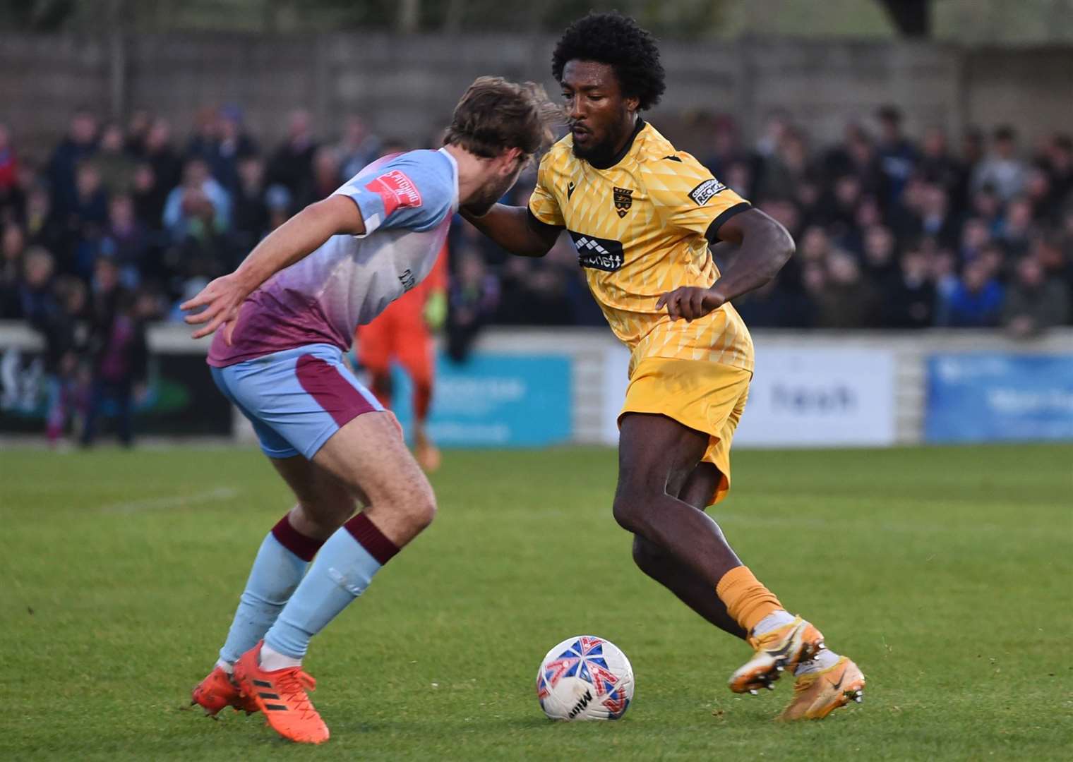 Maidstone’s Devonte Aransibia runs at the Chesham defence in their FA Cup tie. Picture: Steve Terrell