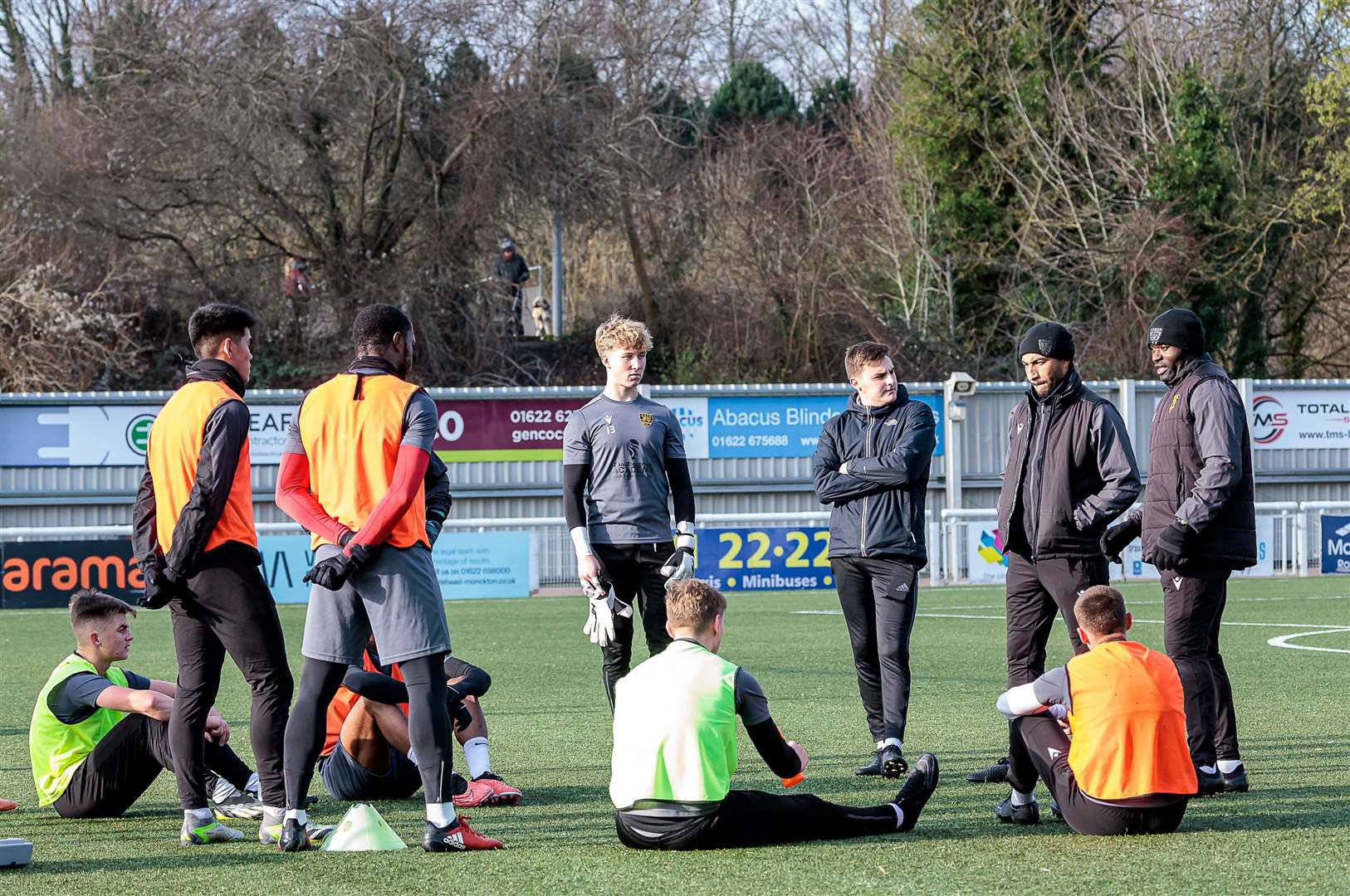 Jamie Hemsley in conversation with assistant manager Craig Fagan and boss George Elokobi. Picture: Helen Cooper