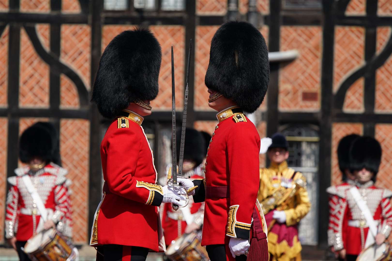 The commanding officers of the old (left) and new guard of the 1st Battalion Grenadier Guards during the Changing of the Guard ceremony (Andrew Matthews/PA)