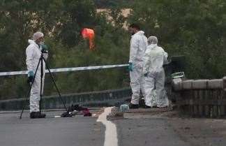 Forensics on the scene of the car fire Picture: UKNIP