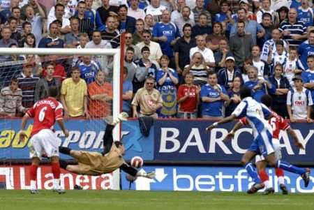 Scott Carson makes a flying save from Kanu. Picture: MATTHEW WALKER