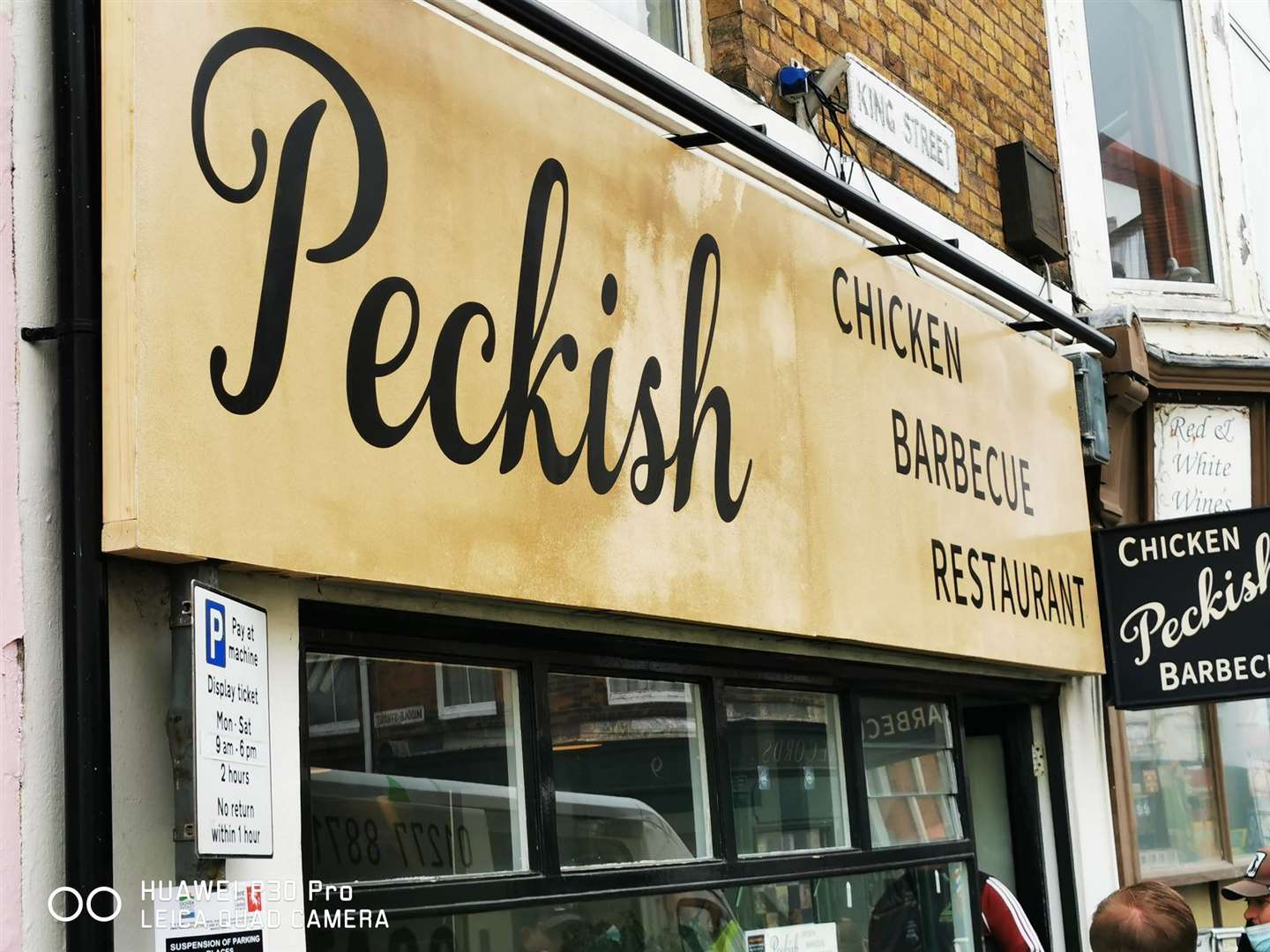Pekish Chicken shop gets to keep its name, but its sign needed the 70s touch