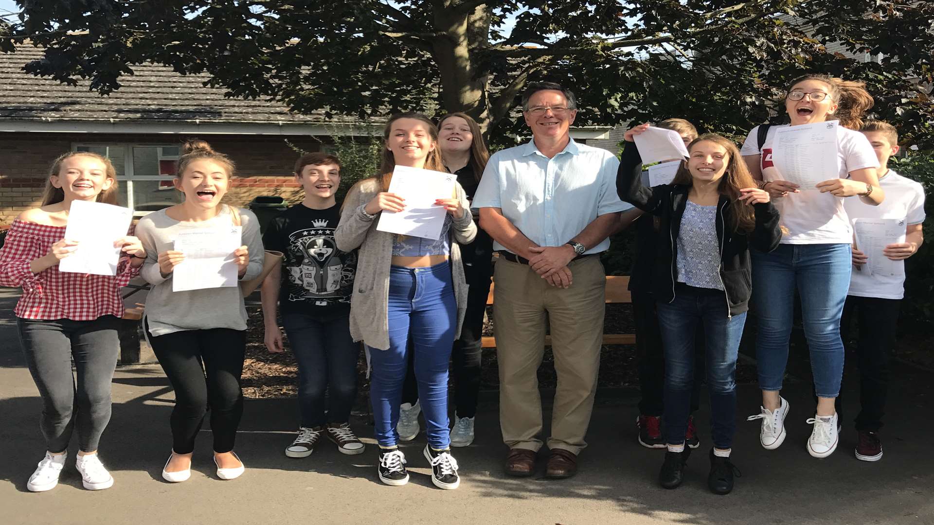 Fulston Manor head teacher Alan Brookes with GCSE pupils and their results