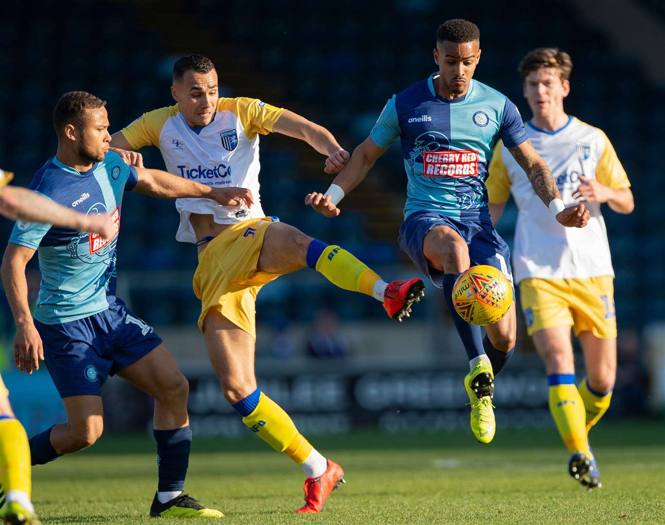 Graham Burke challenges for the ball with Wycombe's Paris Cowan-Hall Picture: Ady Kerry