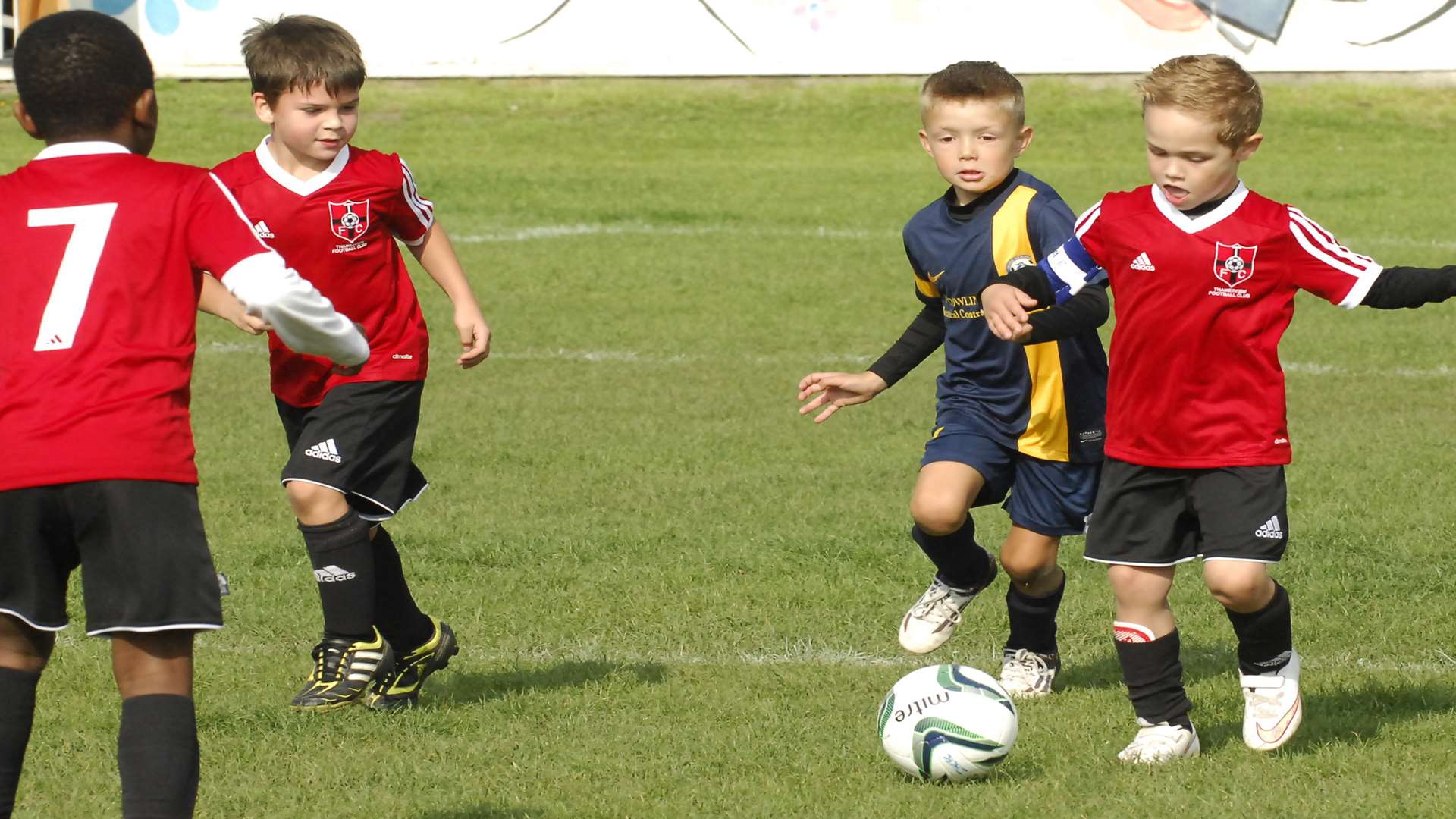 Iwade Herons Colts under-7s and Thamesview Rangers do battle Picture: Chris Davey