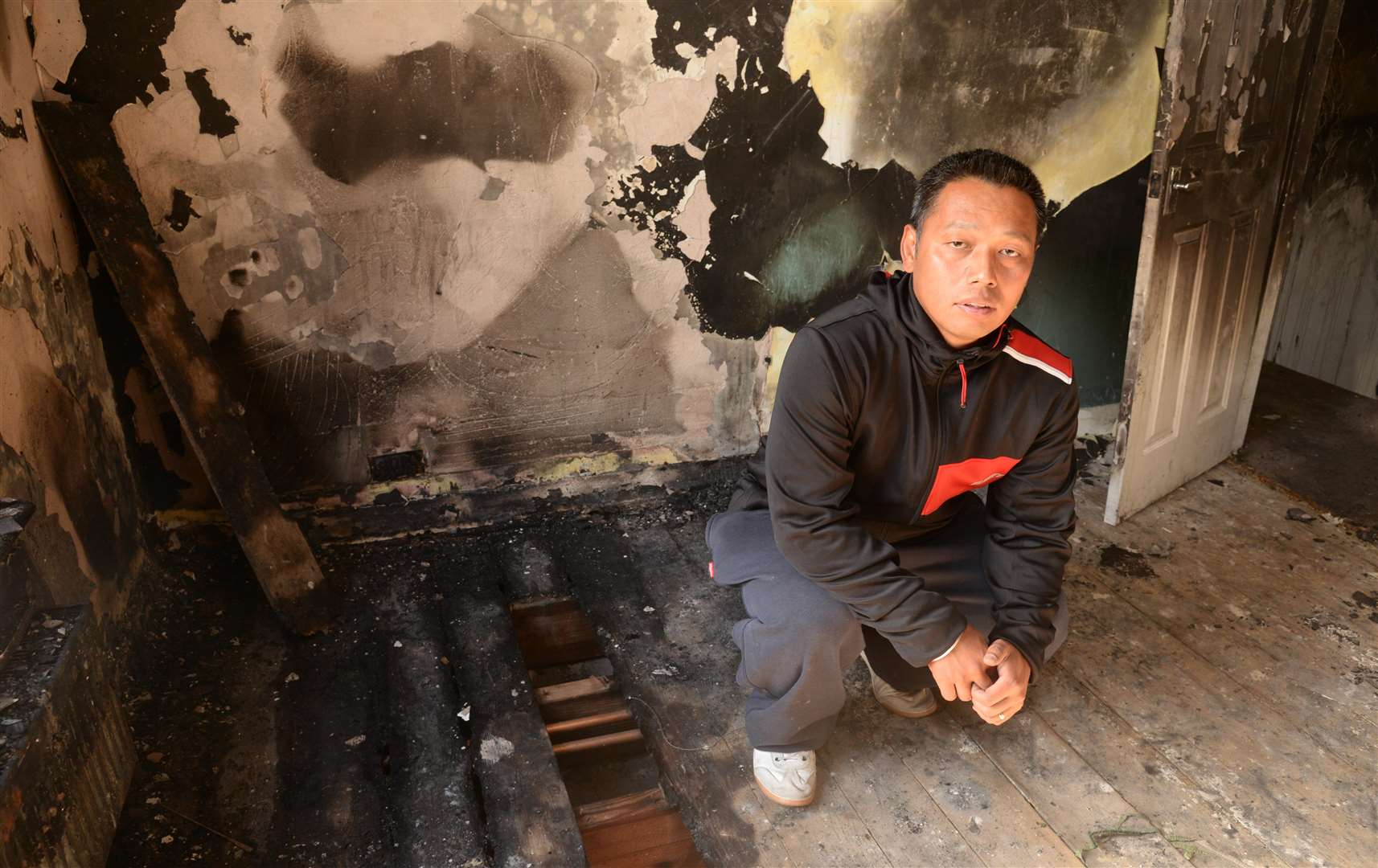 Robin Thapa in the bedroom where the blaze began. Picture: Chris Davey.