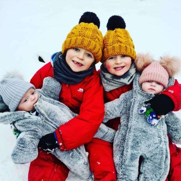 The Wright stuff meet the white stuff: Albie and Joseph Wright take twin siblings India and Byron outside for their first pictures in the snow. The twins are aged 15 weeks.