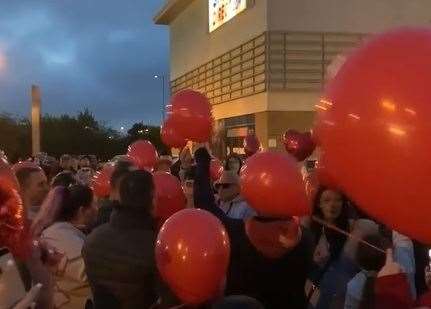 The red balloon release in memory of Cavan Scott. Picture: Ricky Bain