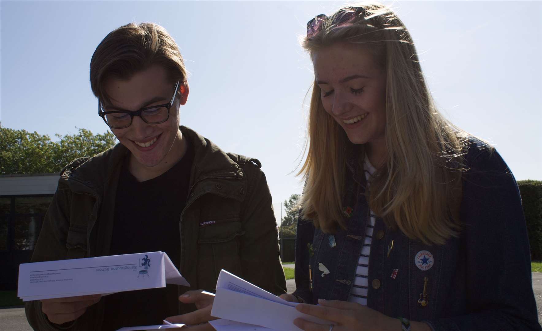 Alfie Gevaux-Ross and Katie Spender compare results at The Sittingbourne School