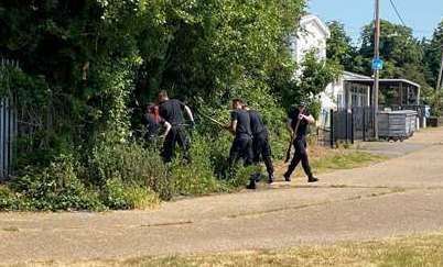 About 20 officers were seen searching undergrowth in Fourth Avenue in Eastchurch