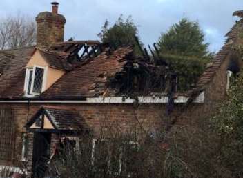 The bungalow has been left badly damaged. Picture: Kent Fire and Rescue Service.