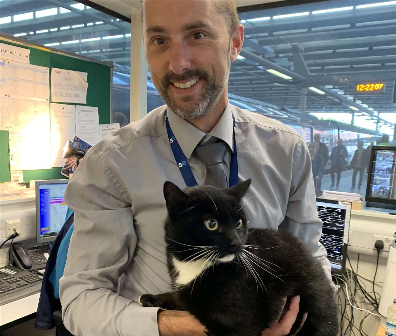Southeastern station manager for St Pancras, Steve Butcher, with the cat (10362814)