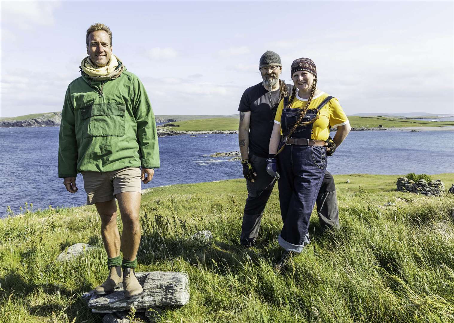Presenter Ben Fogle with crofters Jason and Helen stood by the coast near their new home. Photo: Renegade Pictures (UK) Ltd