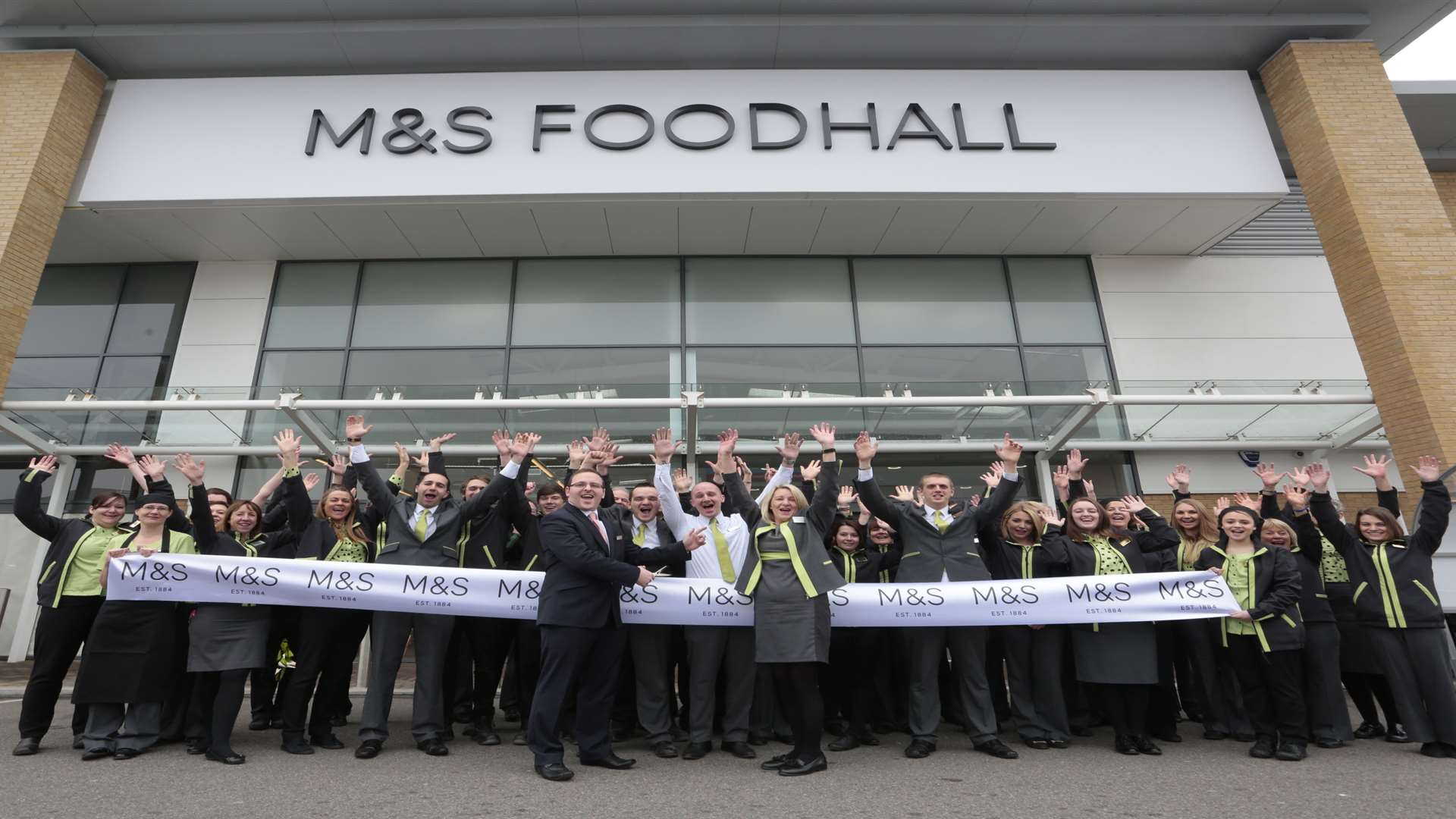 Staff celebrate the opening of the store