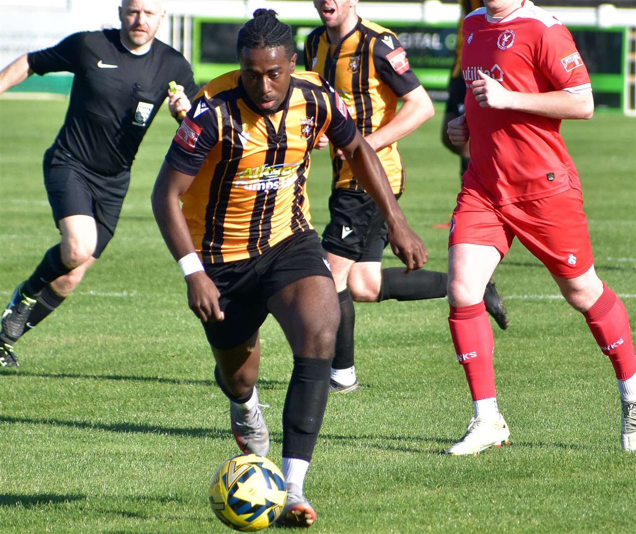 Ira Jackson drives forward on Saturday in Folkestone's shoot-out success over Whitehawk. Picture: Randolph File