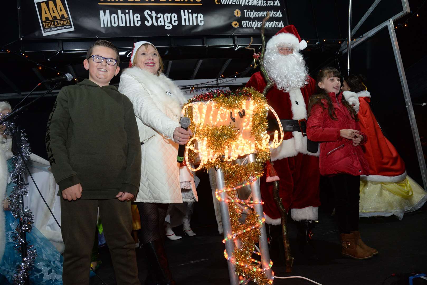 Harvey Walters and Amber Paige helped Santa and BRFM's Tracy Topsom turn on the Sittingbourne Christmas Lights in 2018. Picture: Chris Davey